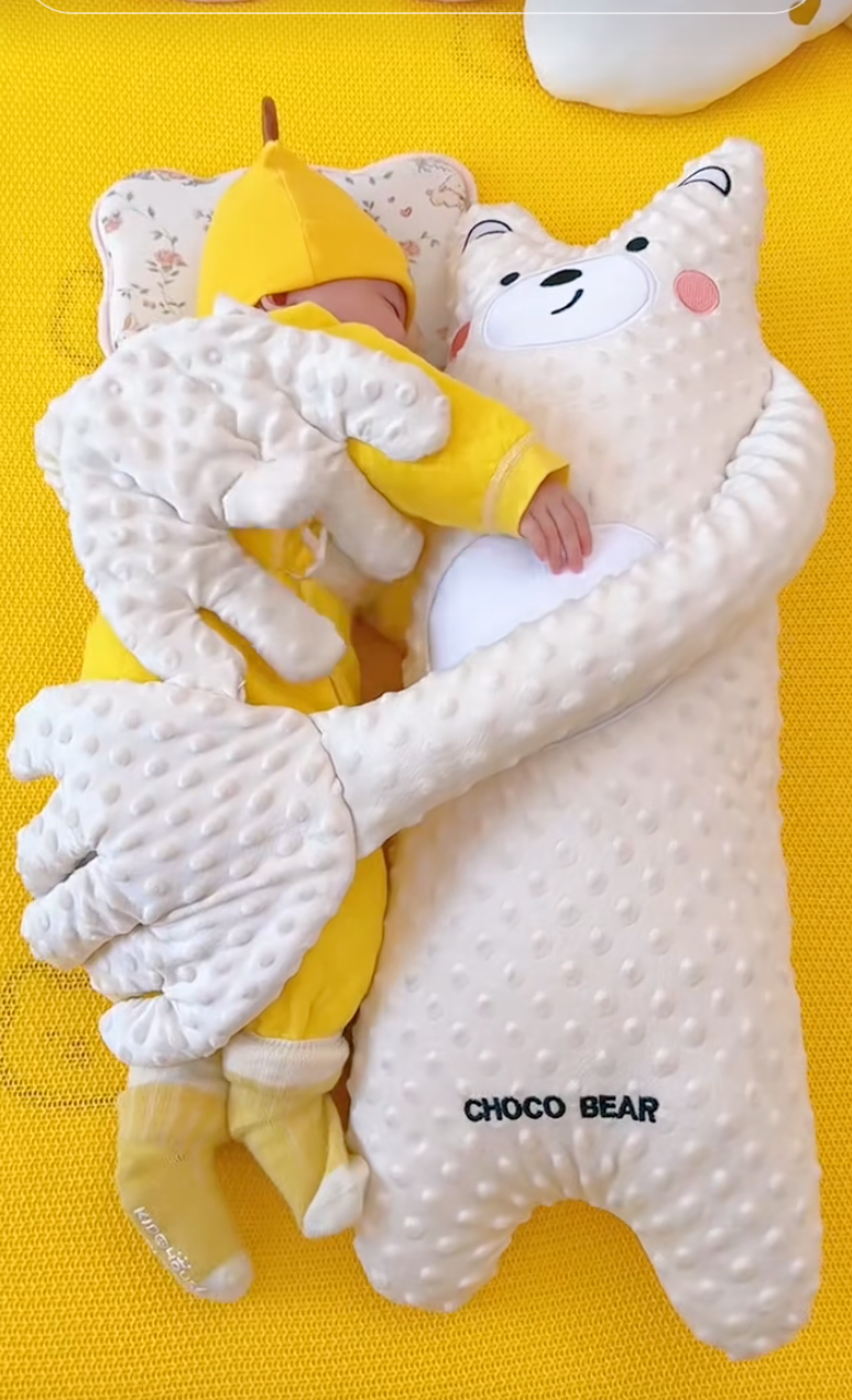 Almohada de Mano Eléctrica para bebés lo abraza, lo tranquiliza y lo ayuda a dormir solito.